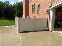 Fence Gallery Photo - 4 ' high PVC with plate mount to driveway.jpg